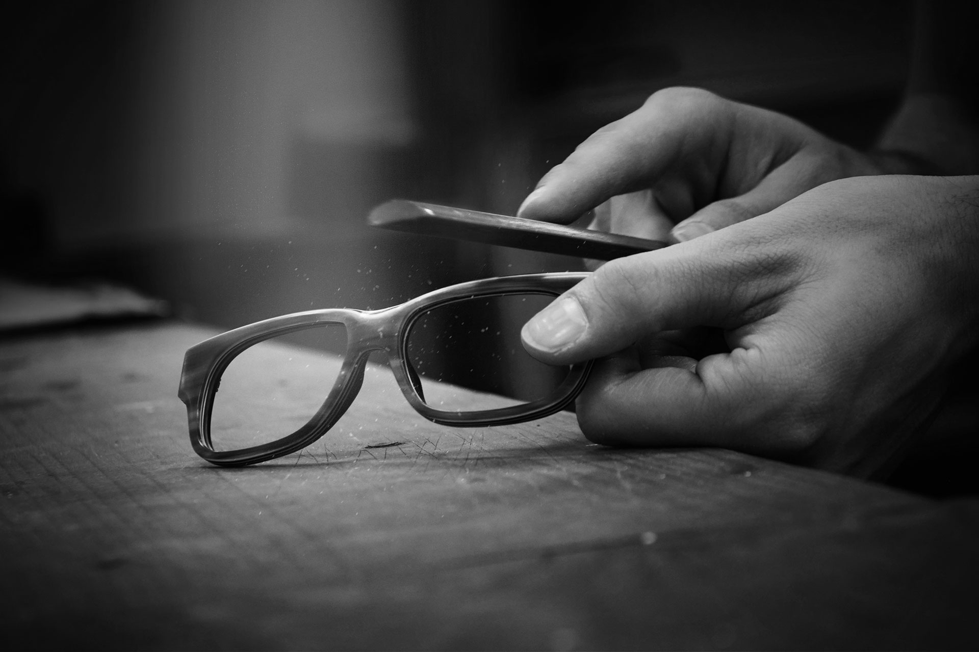 Tom Davies frames being filed by hand at the brand's London factory