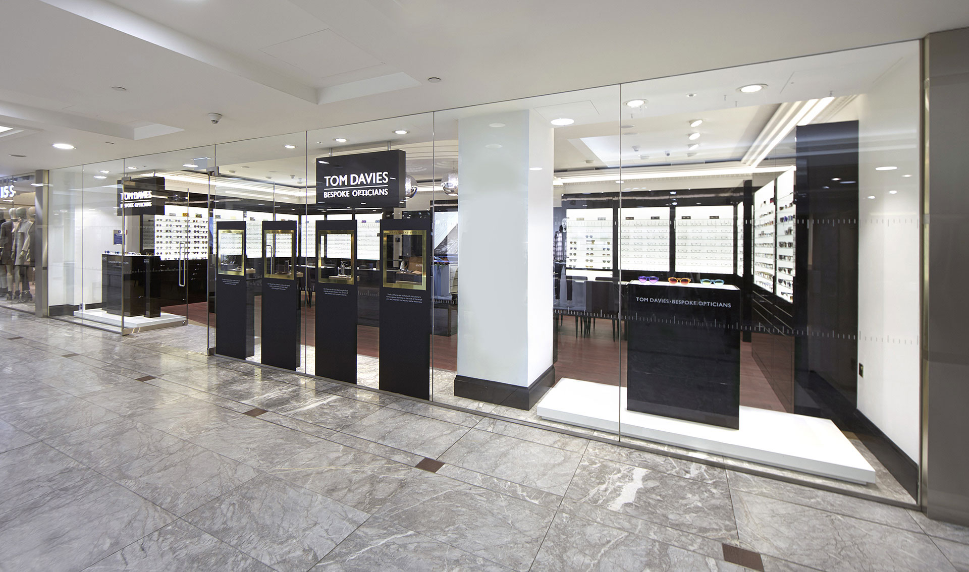 Store front of Tom Davies Bespoke Opticians in Canary Wharf, London