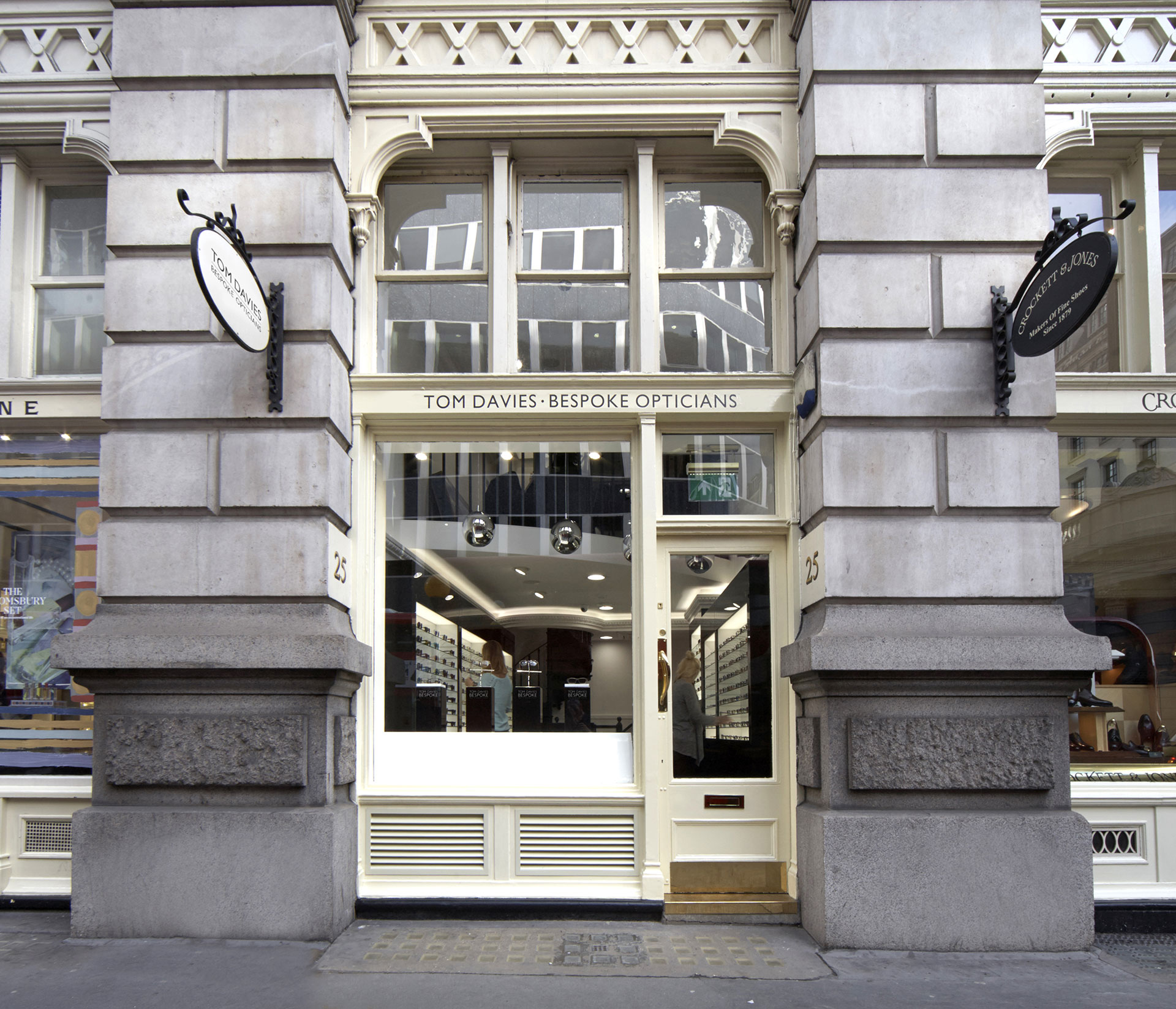 Store front of Tom Davies Bespoke Opticians in Royal Exchange, City of London