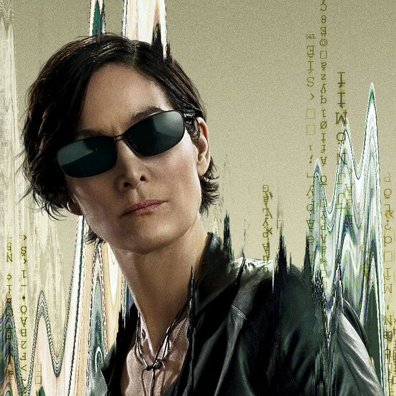 Trinity, played by Carrie-Anne Moss, wearing Trinity sunglasses. Bespoke for The Matrix Resurrections, designed by Tom Davies