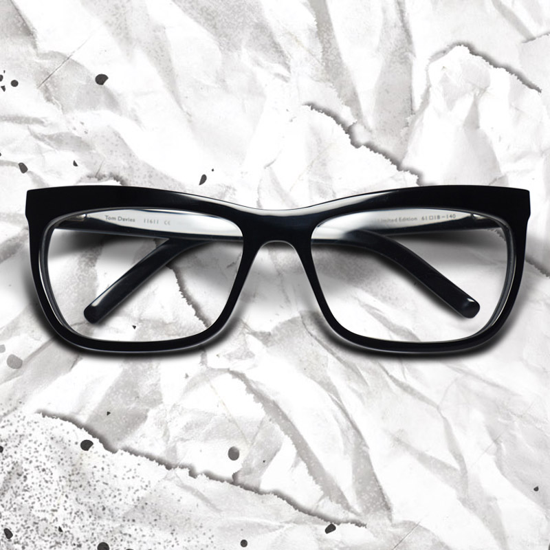 Andrew Leung as Jeffrey wears glasses in Disney's Cruella, designed by Tom Davies.