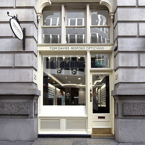 Optical frames and sunglasses made in England. Tom Davies Royal Exchange specialises in a lunchtime bespoke fitting service. Same-day eye tests available.