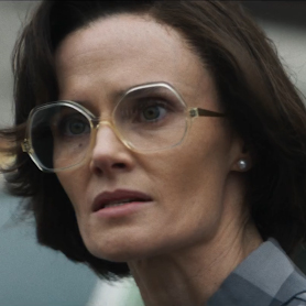 Janet Smurl wearing Tom Davies oversized 80s inspired angular acetate frames.