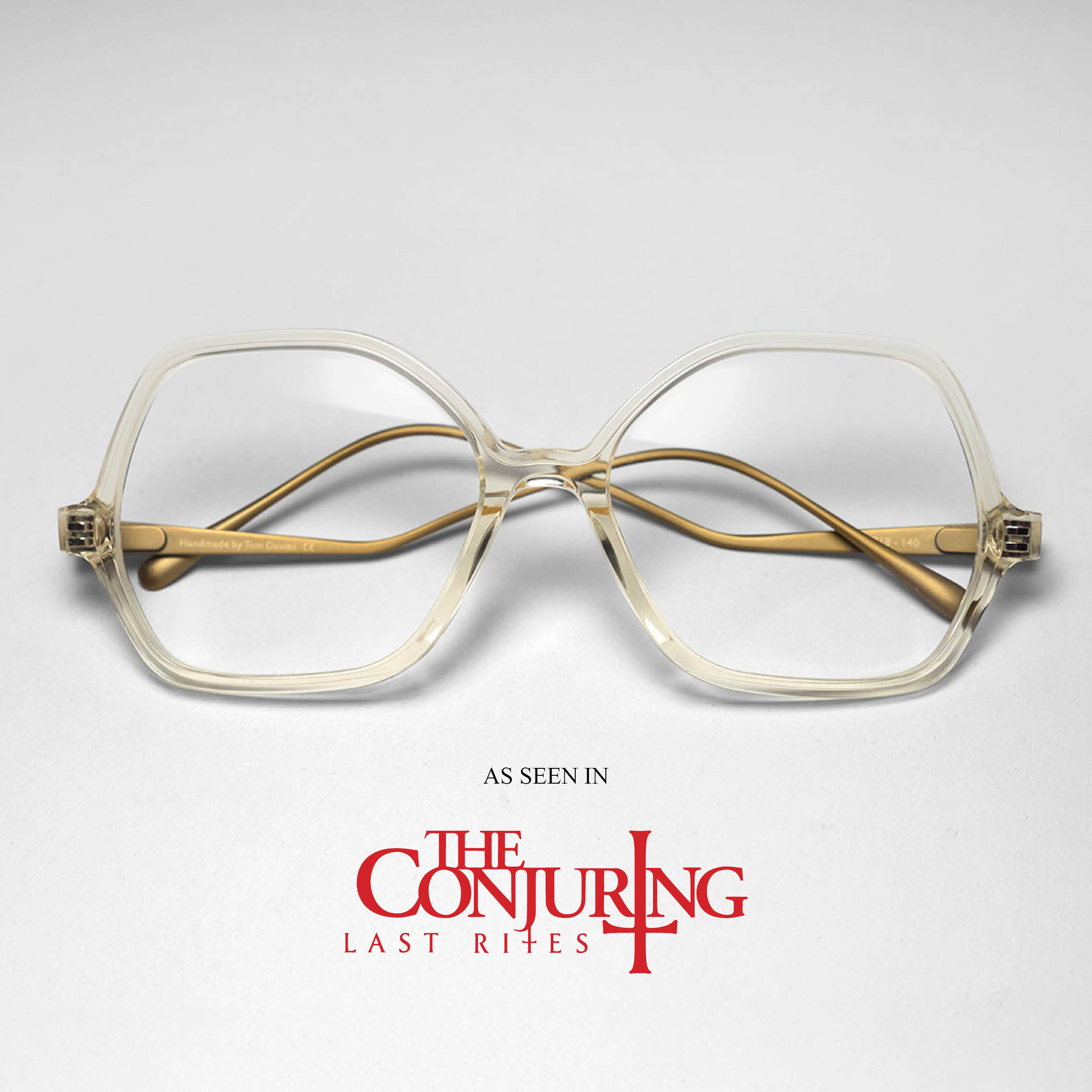 Janet Smurl wearing Tom Davies oversized 80s inspired angular acetate frames.