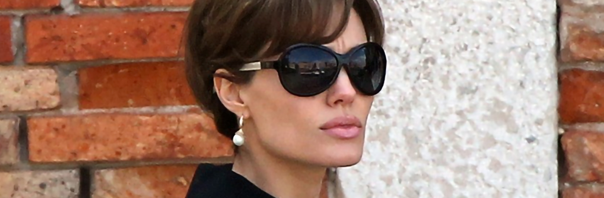 Shop the sunglasses worn by Angelina Jolie in The Tourist. Designed by iconic British eyewear designer, Tom Davies.