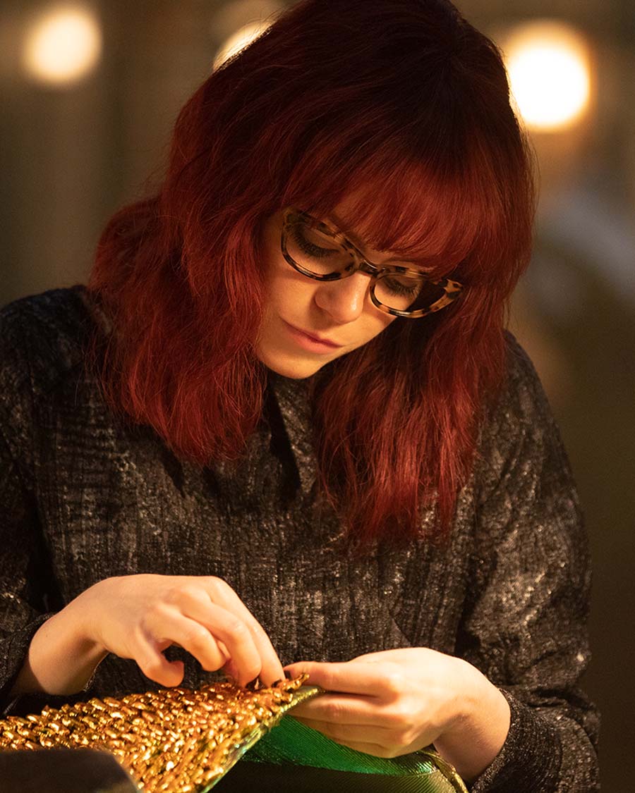 Emily Stone wears Tom Davies in Cruella