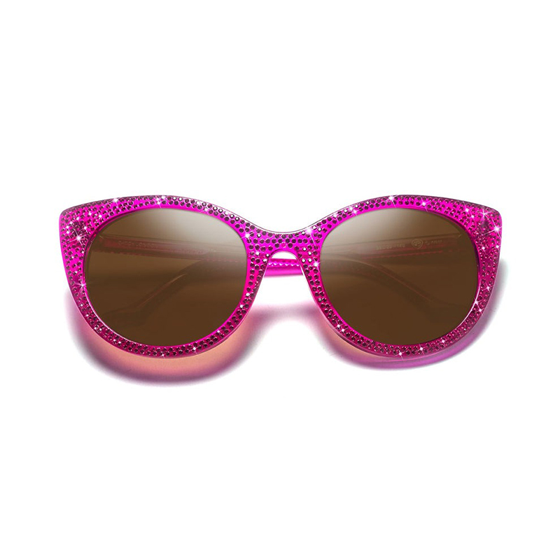 Shop these iconic crystal-encrusted sunglasses in purple designed by Tom Davies for The Wizard of Oz eyewear collection.