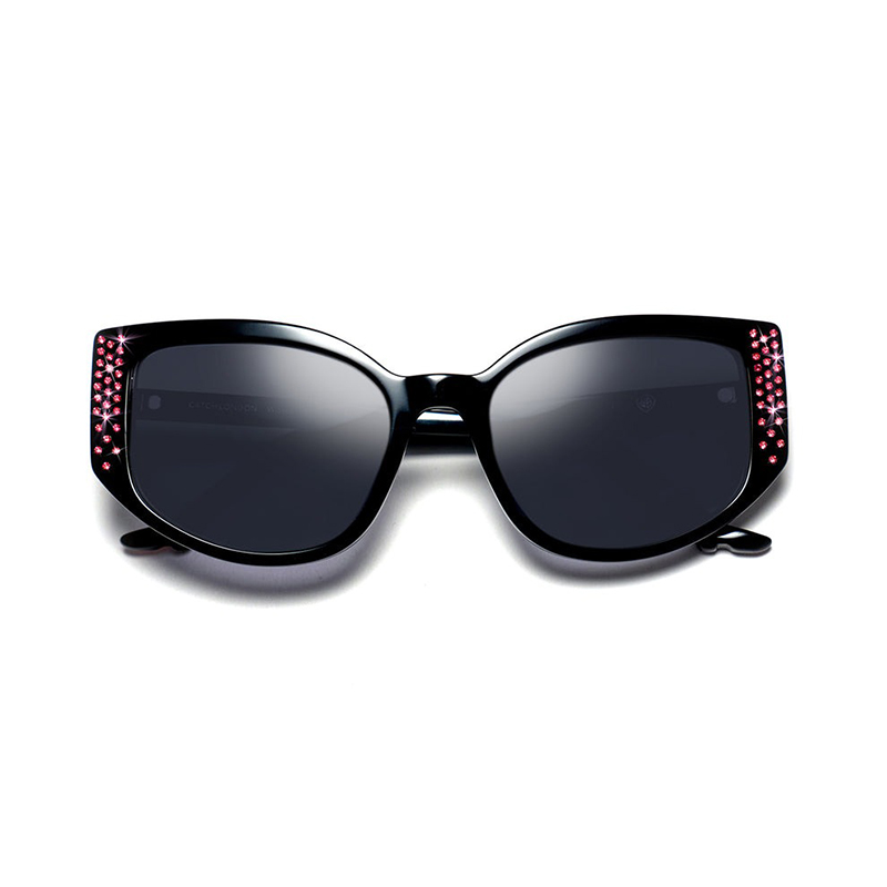  Shop these iconic crystal-encrusted sunglasses in premium crystal green acetate.